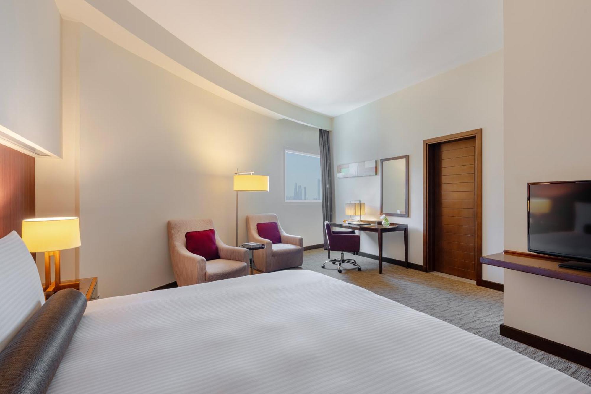 Grand Millennium Al Wahda Hotel And Executive Apartments アブダビ エクステリア 写真